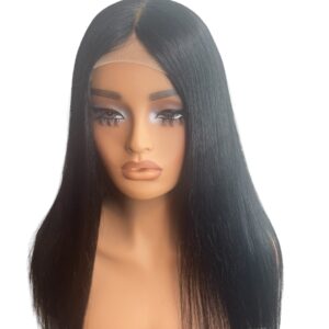 A woman 's head with long black hair.